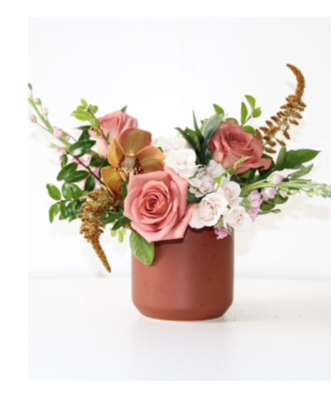 dusty terracotta pink roses in dramatic bohemian style